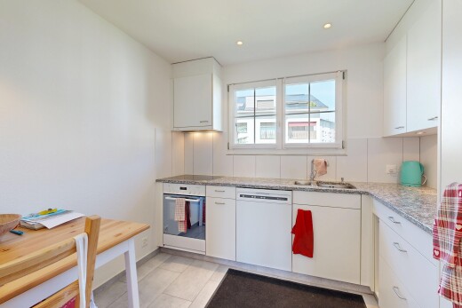 kitchen with stainless steel oven, white cabinetry, white dishwasher, recessed lighting, and light stone countertops