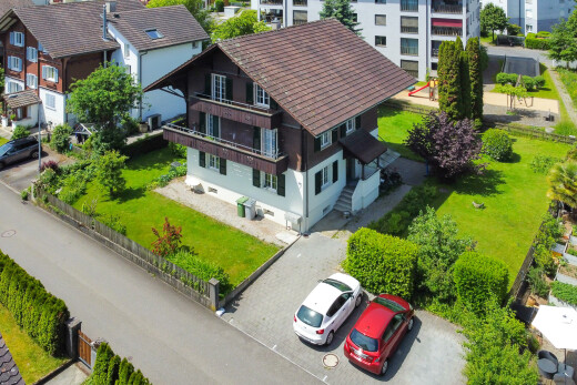 view of home featuring a balcony