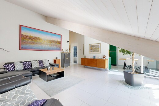 living room featuring wood ceiling and light tile patterned floors