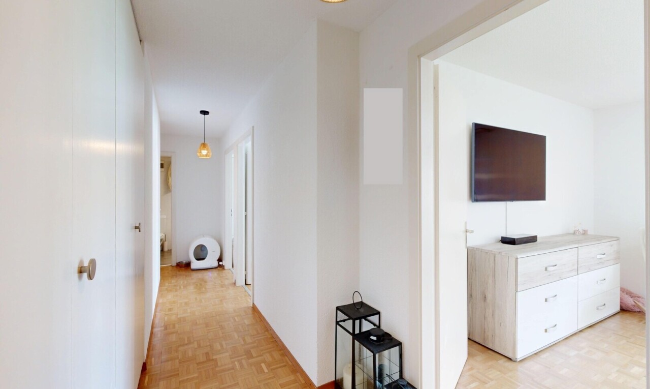 corridor with parquet flooring
