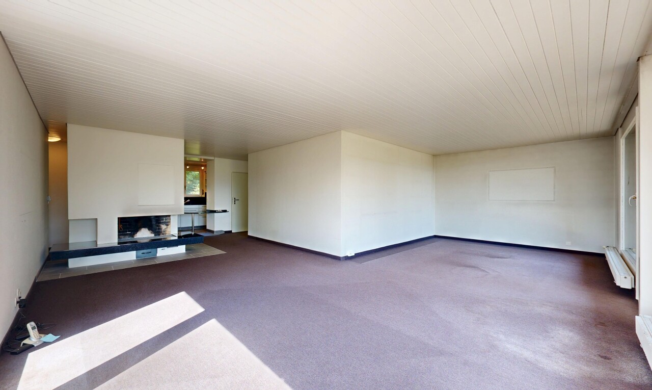 wohnzimmer mit teppich, carpet, gipskartonwand, drywall, und inside property