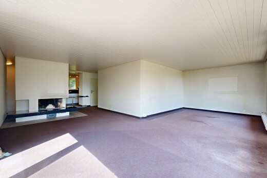 wohnzimmer mit teppich, carpet, gipskartonwand, drywall, und inside property