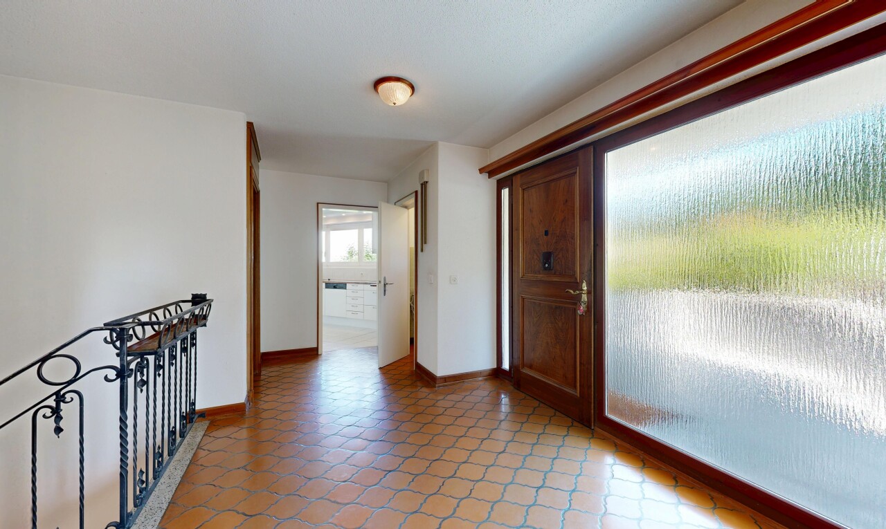 halle / korridor mit drywall, gipskartonwand, baseboards wall, sockelleisten, und inside property