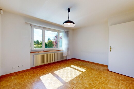 zimmer / schlafzimmer mit parquet floor, holzfußboden, wood finish floor, gipskartonwand, und drywall