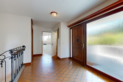 halle / korridor mit drywall, gipskartonwand, baseboards wall, sockelleisten, und inside property