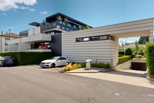 außenansicht mit day time, property visible, parkplatz, und horizontale verkleidung