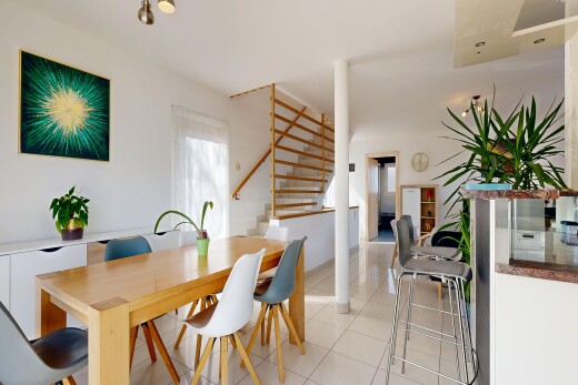 dining area with stairway and light tile patterned flooring
