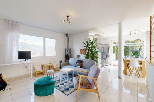 living / dining area featuring light tile patterned floors