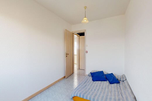 unfurnished room with baseboards and light floors