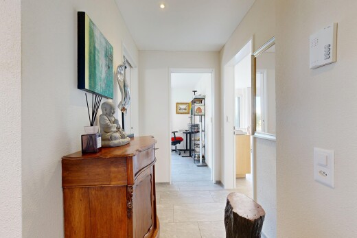 hallway with recessed lighting
