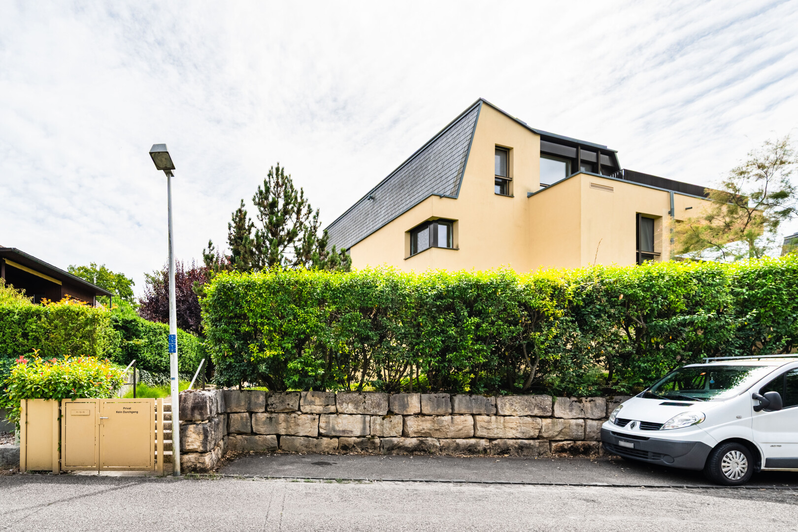 façade avec bardage en stuc et property visible