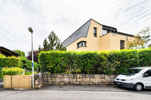 façade avec bardage en stuc et property visible