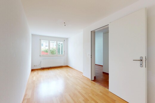 empty room with radiator and light wood finished floors