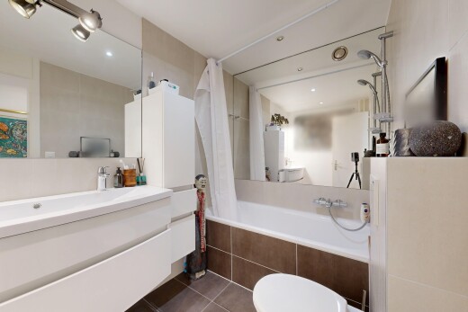 full bath with vanity, tiled shower / bath, dark tile patterned flooring, and recessed lighting