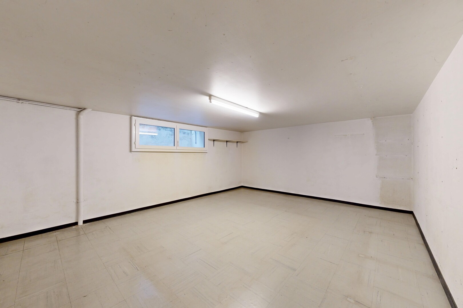unfurnished room with light floors