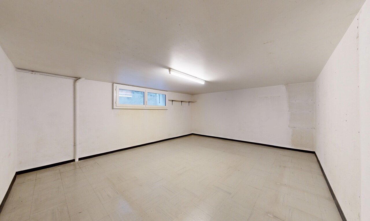 unfurnished room with light floors