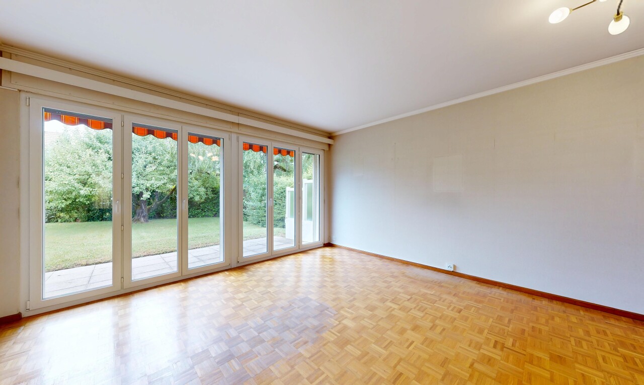 spare room with parquet flooring and crown molding