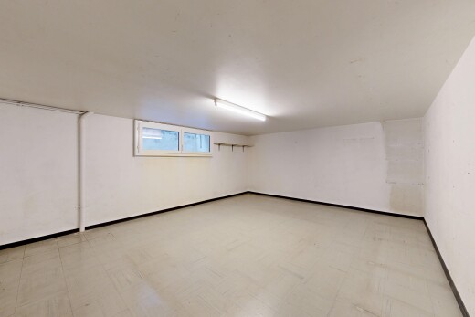 unfurnished room with light floors