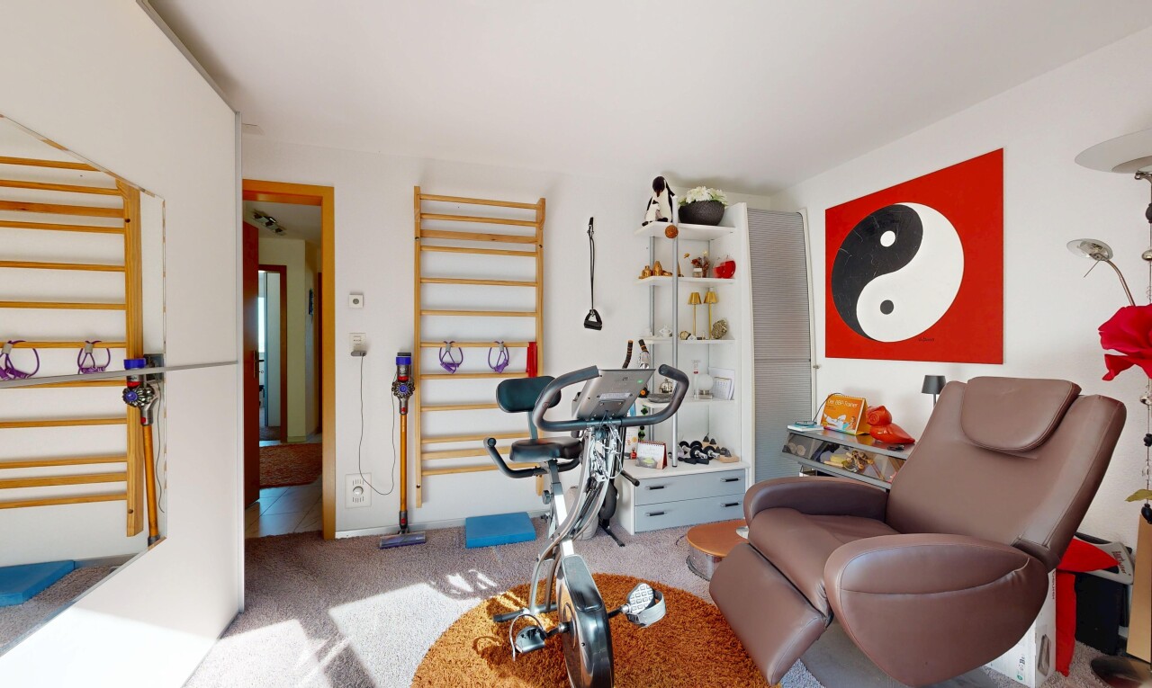 gym avec inside property, carpet, moquette, drywall, et cloison sèche