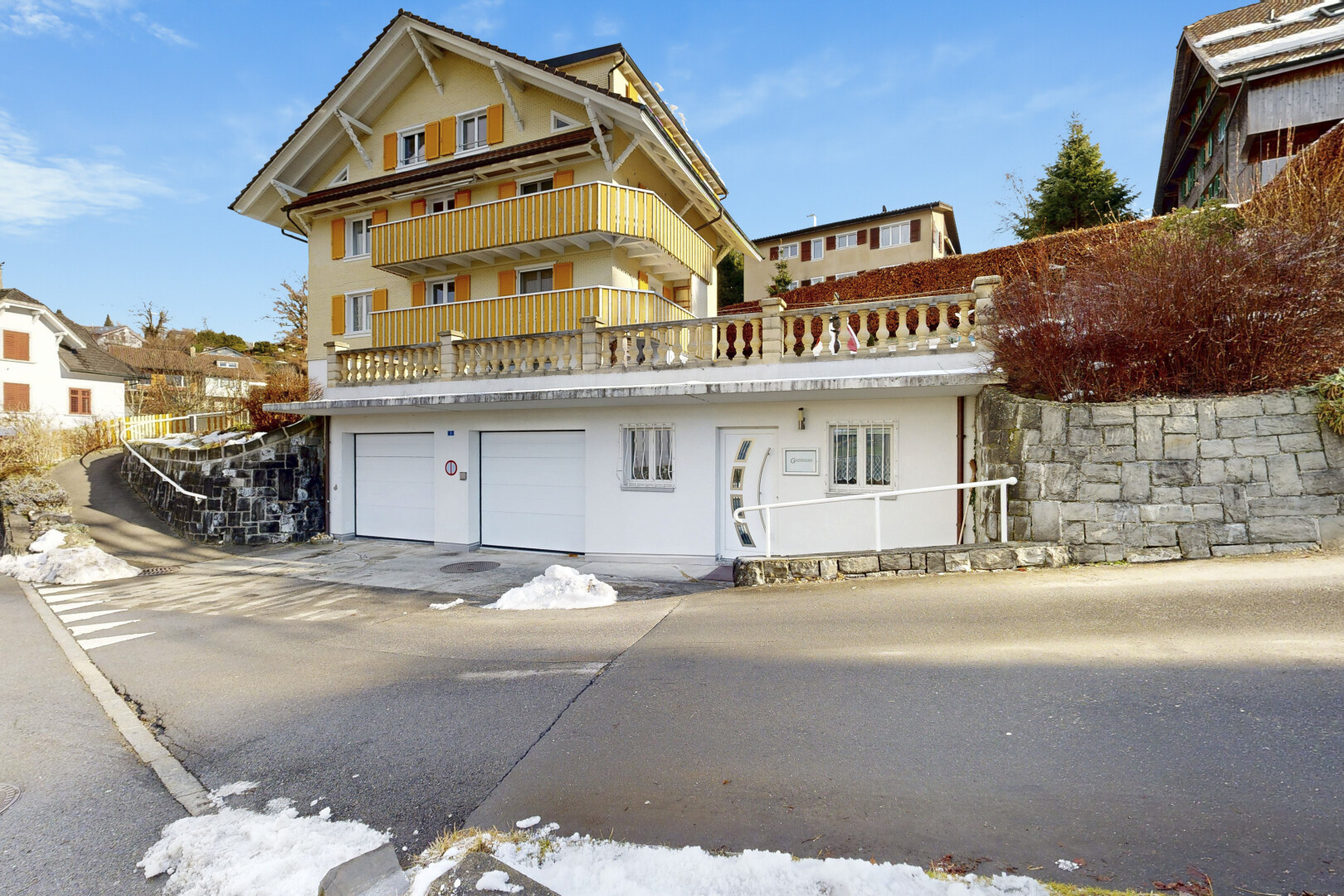 view of building exterior with a garage