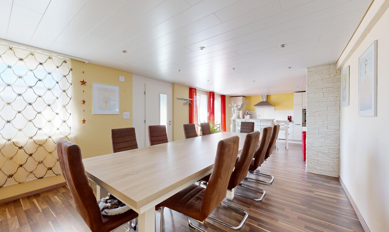 dining area with wood finished floors