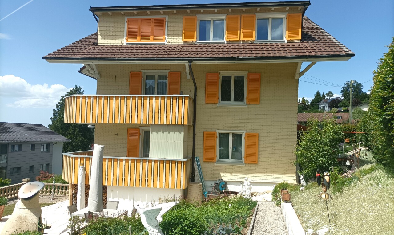 außenansicht mit day time, property visible, und ziegelverkleidung
