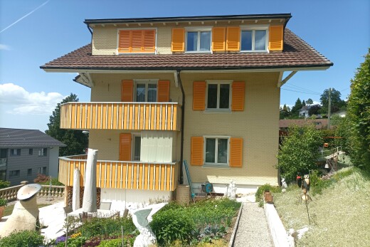 façade avec day time, property visible, et bardage en brique