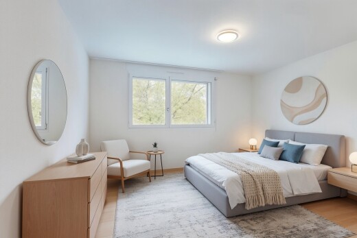 chambre avec espace bureau, natural light, lumière naturelle, inside property, et wood finish floor