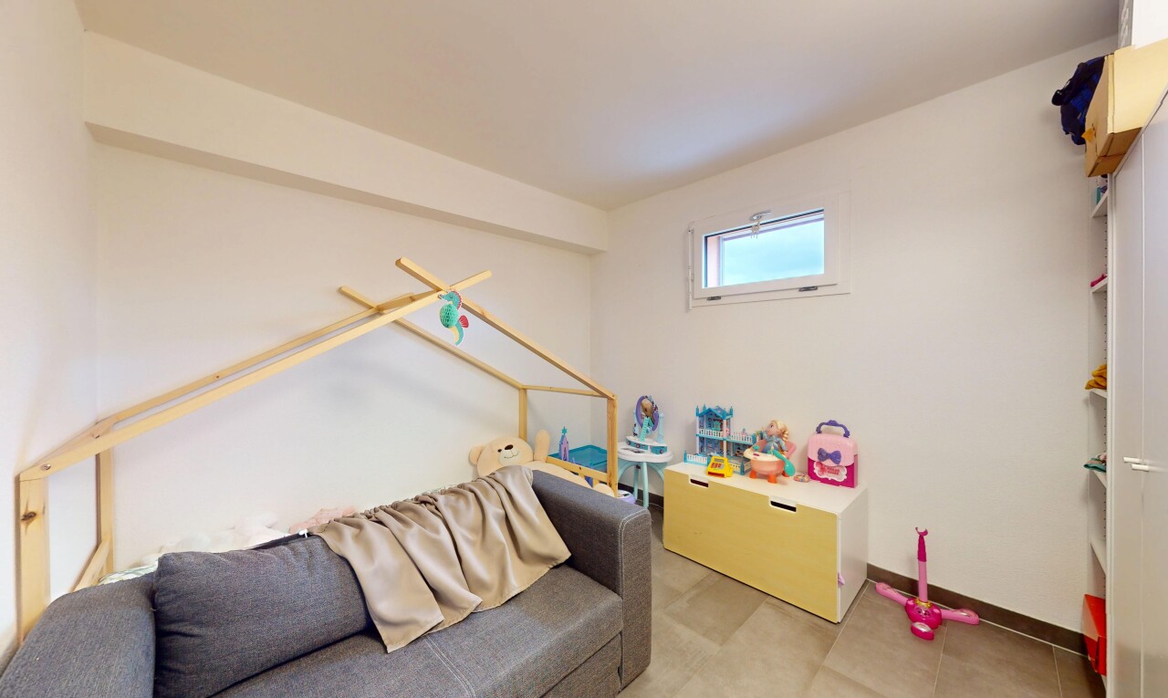 living room featuring baseboards