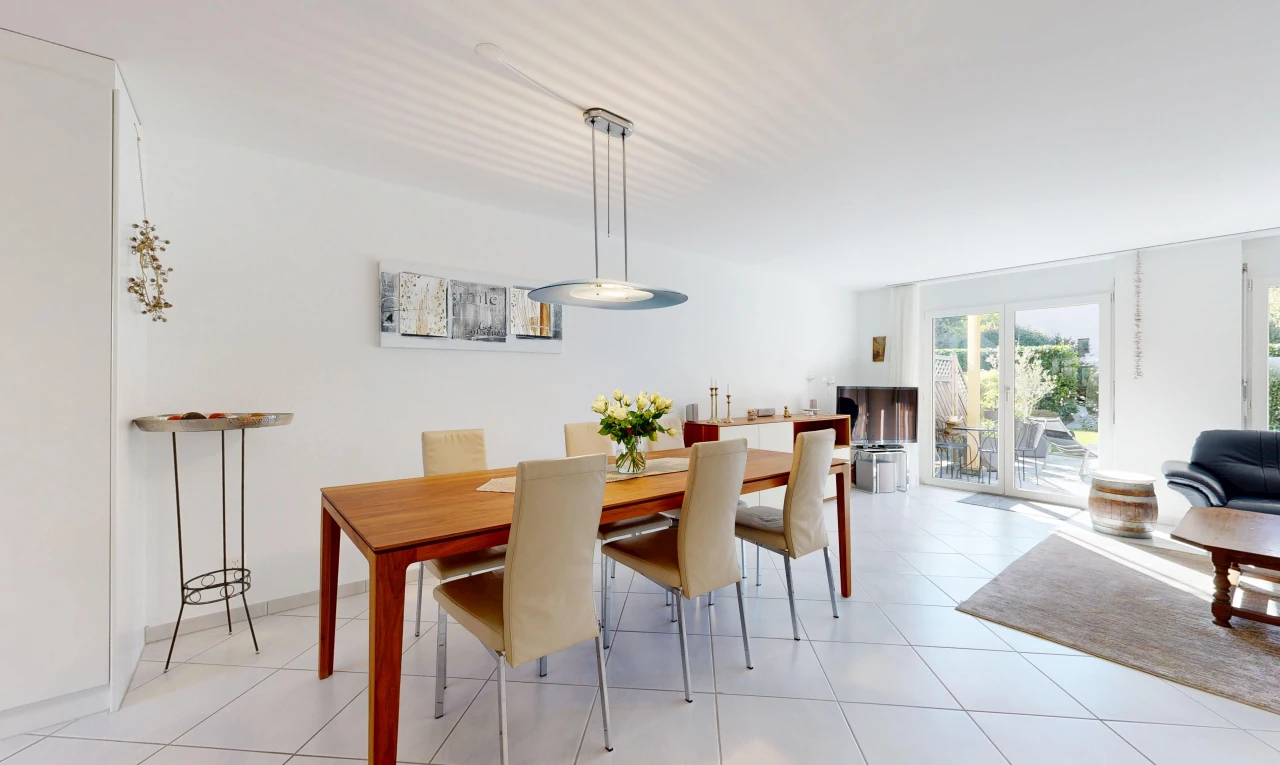 dining room featuring access to exterior and light tile patterned floors