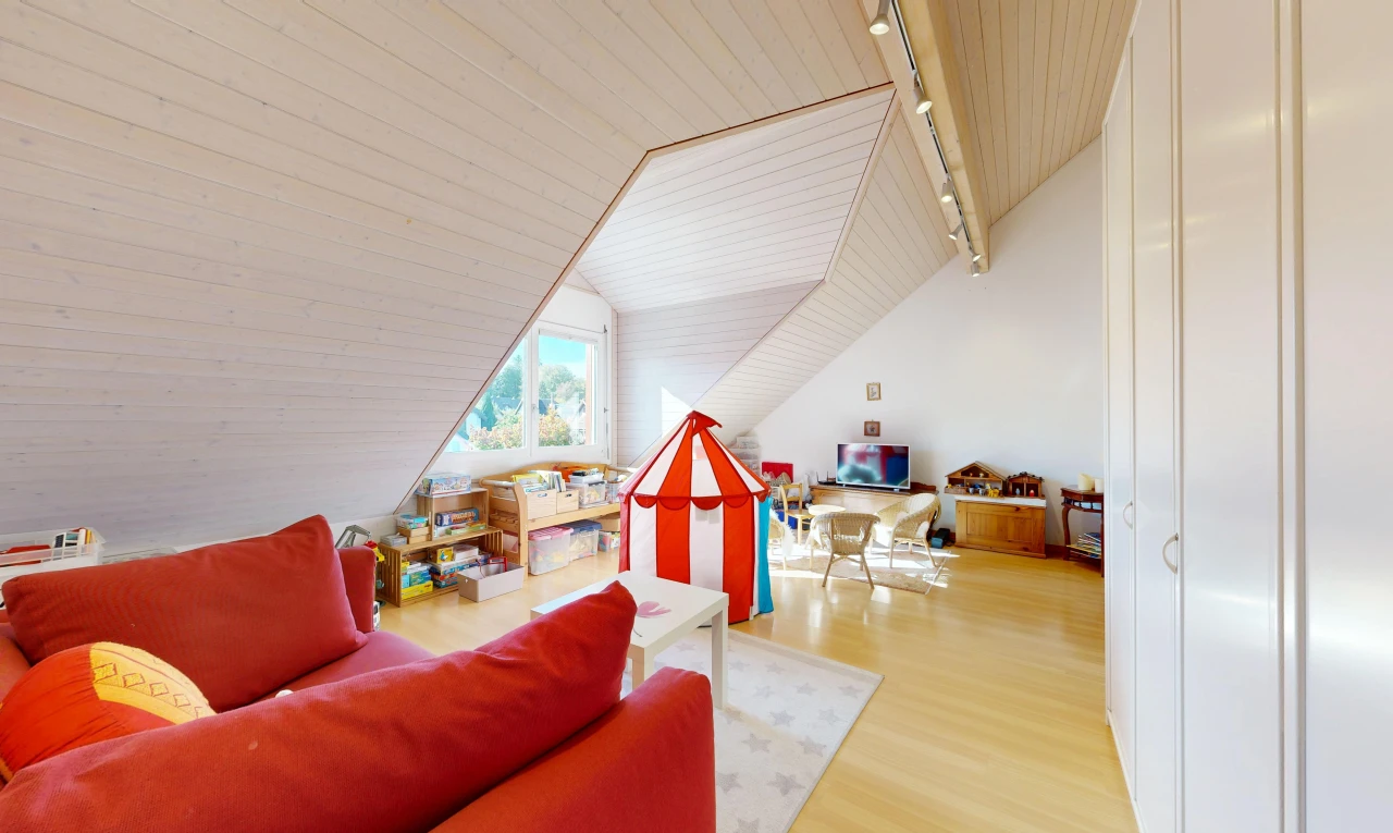 living room with a vaulted wood ceiling, light wood-style floors, and track lighting