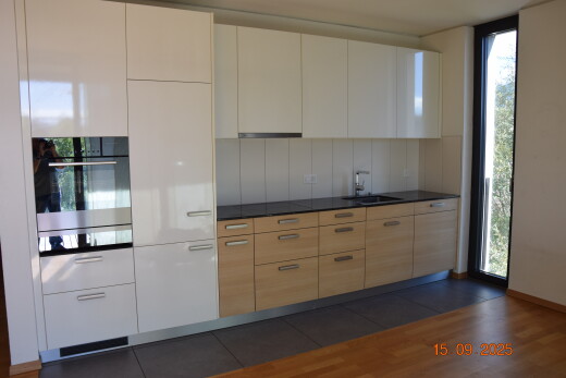 küche mit natürliches licht, natural light, ofen, inside property, und holzfußboden