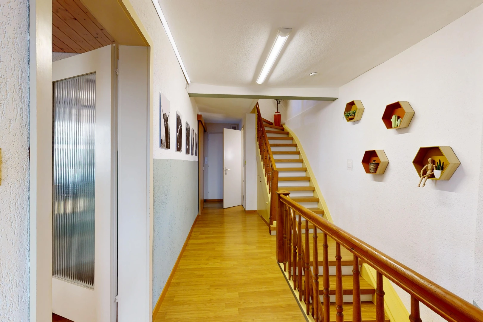 halle / korridor mit treppen, holzfußboden, wood finish floor, und inside property
