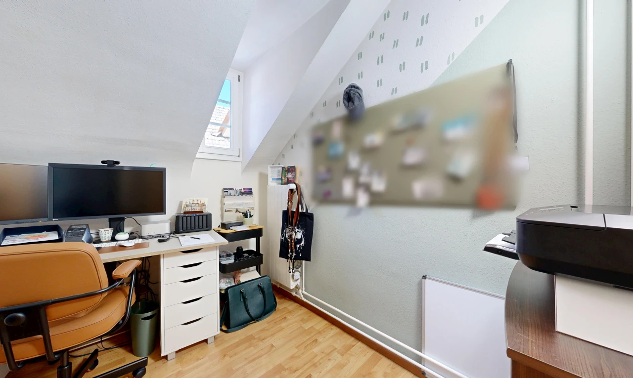 büro mit fernseher, zusätzliches zimmer, holzfußboden, wood finish floor, und inside property