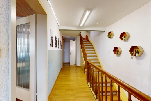 halle / korridor mit treppen, holzfußboden, wood finish floor, und inside property