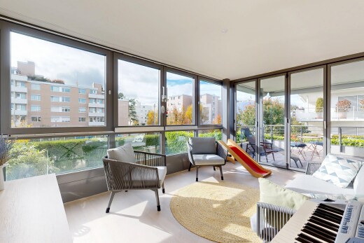 wohnzimmer mit wintergarten, inside property, natural light, natürliches licht, und floor ceiling windows