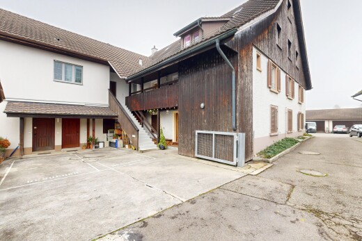 außenansicht mit overcast, holzverkleidung, vertikale verkleidung, treppen, und property visible