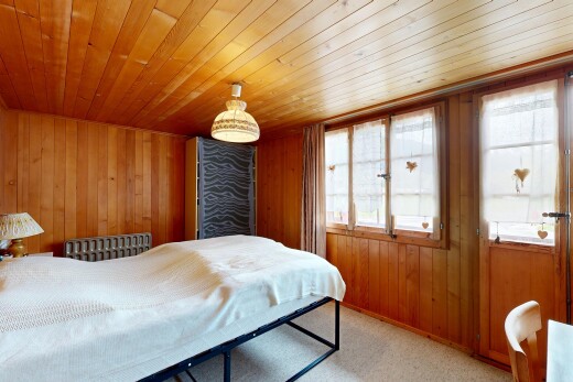 zimmer / schlafzimmer mit wood wall, holzwand, carpet, teppich, und wood ceiling
