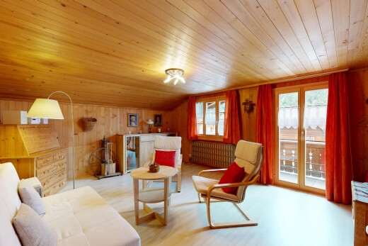wohnzimmer mit inside property, holzwand, wood wall, holzfußboden, und wood finish floor