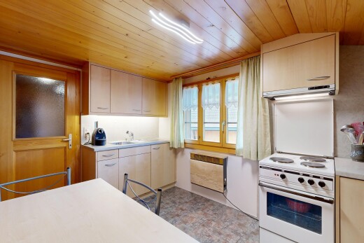 küche mit herd, wood ceiling, holzdecke, light countertops, und arbeitsplatten