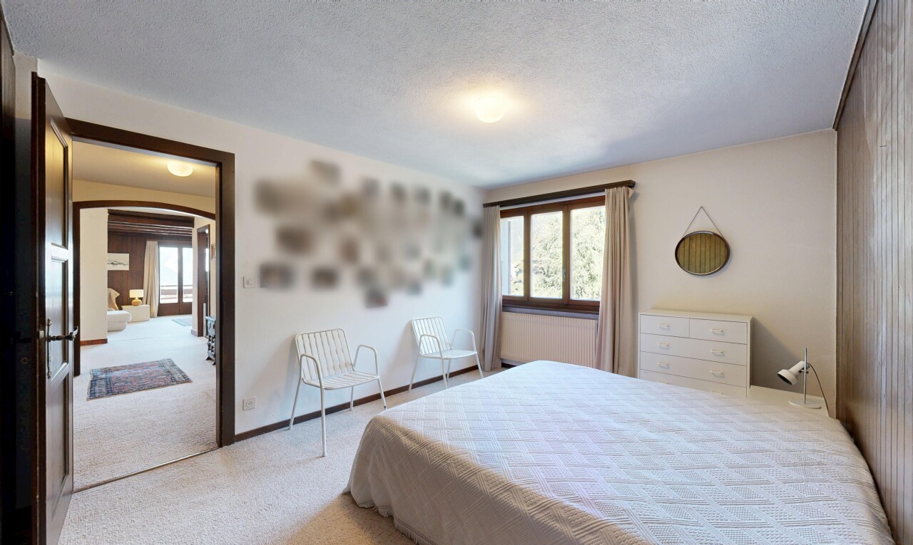 chambre avec passages en arc, carpet, moquette, drywall, et cloison sèche