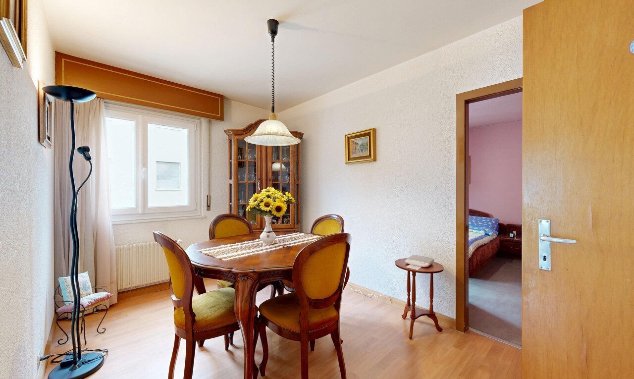 dining space with light wood finished floors