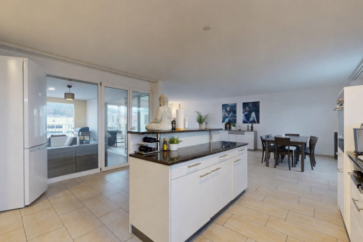 küche mit weiße schränke, kühlschrank, stein arbeitsplatten, natürliches licht, und natural light