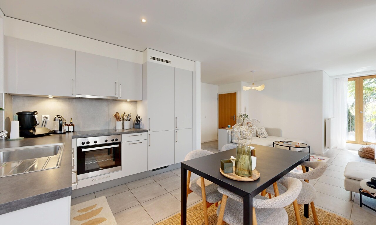 cuisine avec light floor, white cabinets, armoires blanches, four, et dark countertops