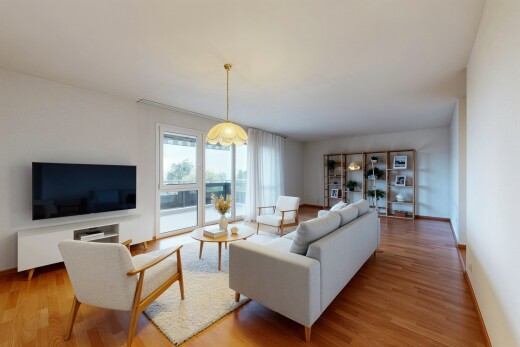 salon avec télévision, inside property, cloison sèche, drywall, et sol en finition bois
