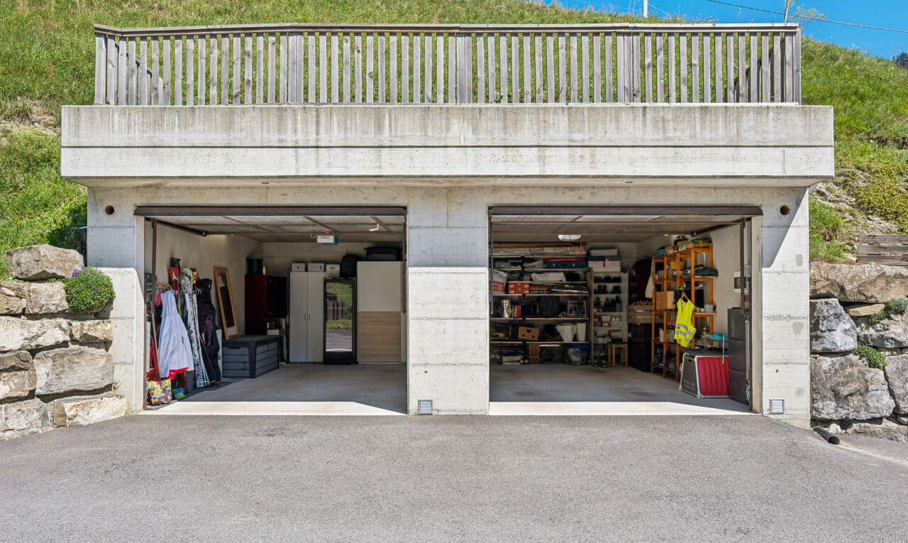 view of parking featuring a garage