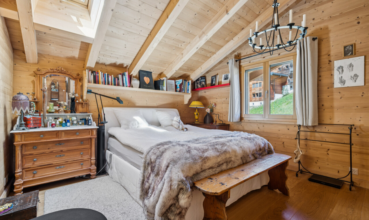 room featuring wood walls, vaulted ceiling with beams, hardwood / wood-style flooring, and wood ceiling