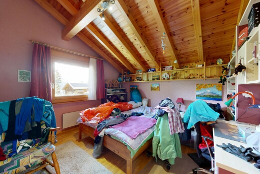 room with light wood finished floors, wooden ceiling, and vaulted ceiling with beams
