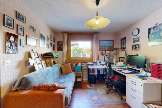 office space featuring a textured ceiling and wood finished floors