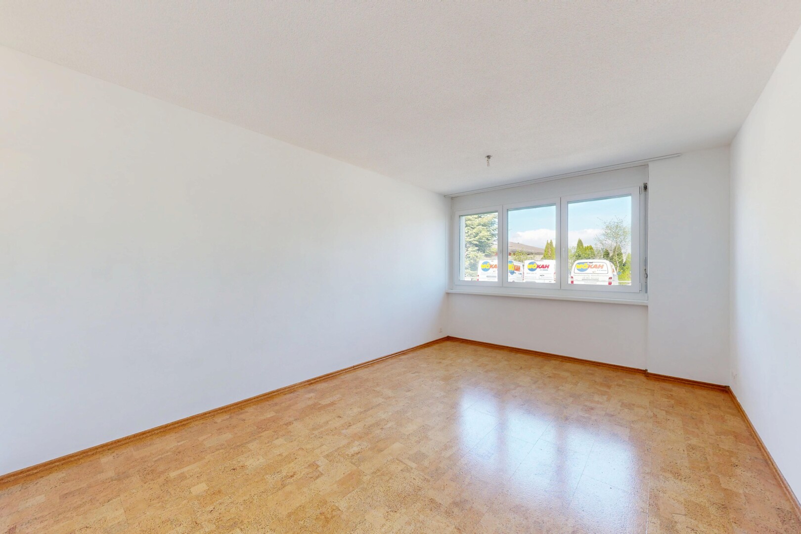empty room featuring baseboards